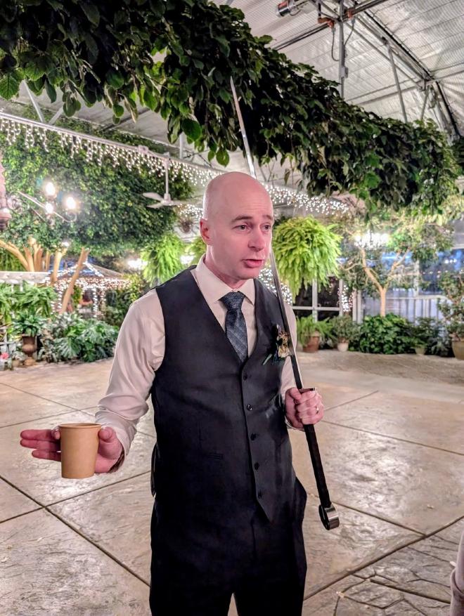 Me carrying a sword at a wedding.